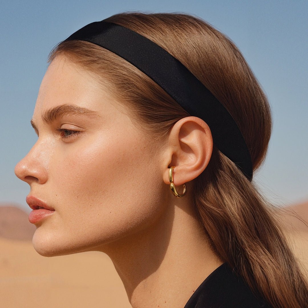 Gold Tone Curved Hoop Earrings - Image 2