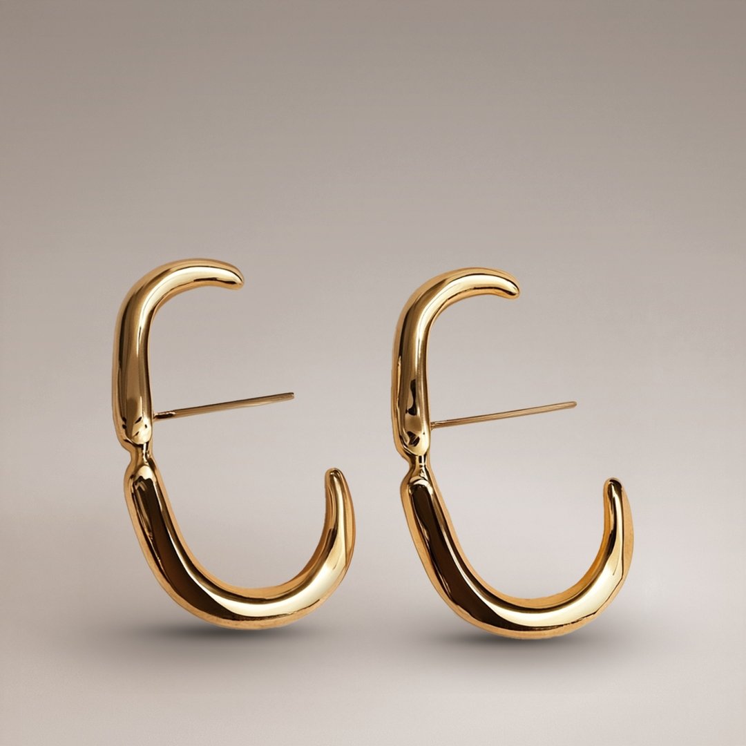 Gold Tone Curved Hoop Earrings
